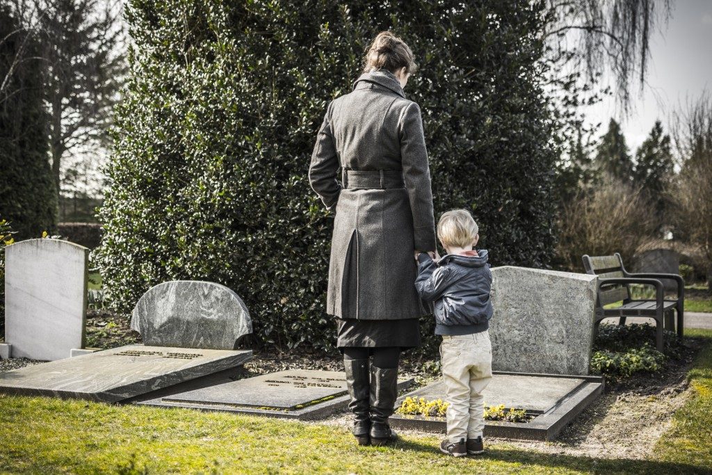 mother and child at the cemetery