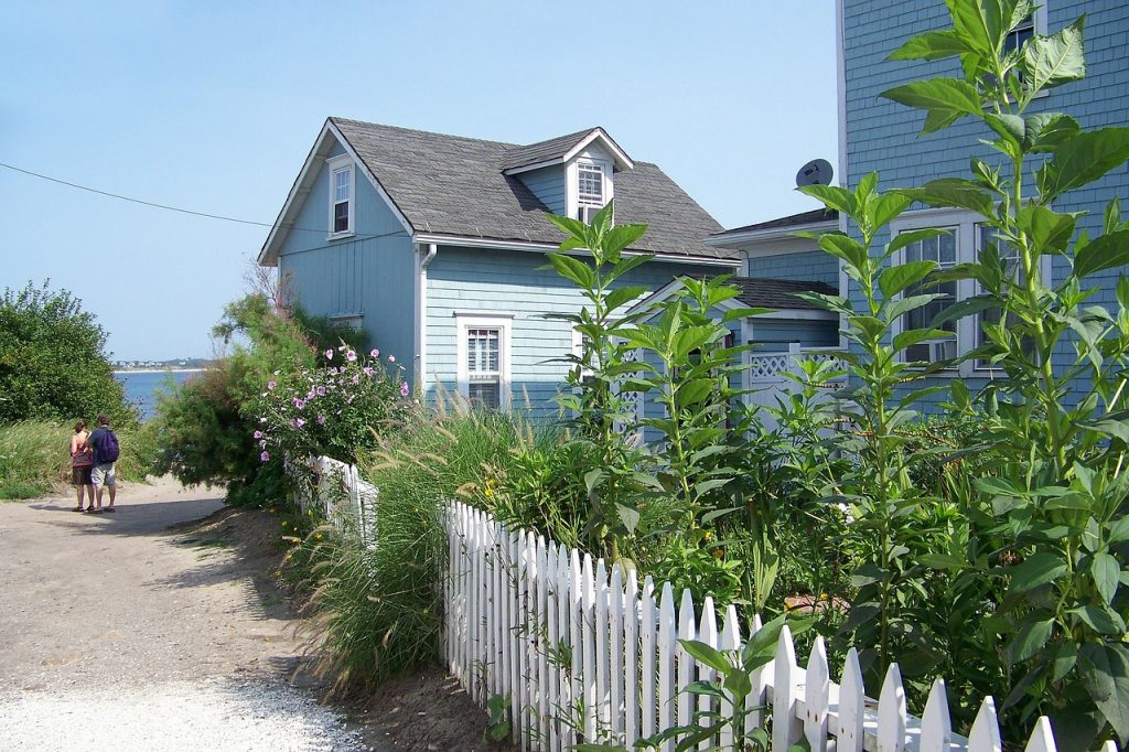 blue-house-with-picket-fence