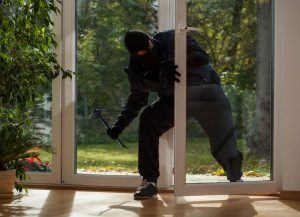 burglar entering home